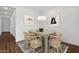 Elegant dining area with table, stylish chairs, and contemporary decor at 20312 W Sells Dr, Buckeye, AZ 85396