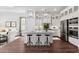 Bright kitchen with stainless appliances, sleek island, and elegant pendant lighting at 20312 W Sells Dr, Buckeye, AZ 85396