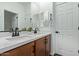This modern bathroom offers dual sinks, and white countertops at 2067 N Marketside Ave, Buckeye, AZ 85396