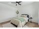 Comfortable bedroom featuring stylish accents and neutral decor at 2067 N Marketside Ave, Buckeye, AZ 85396