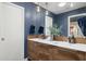 Modern bathroom features a double vanity, stylish lighting, and elegant faucets at 2236 E Sierra St, Phoenix, AZ 85028