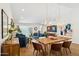 Open living space featuring wood floors and views of the dining area at 2236 E Sierra St, Phoenix, AZ 85028