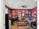 Living room boasts an area rug, comfortable seating, and decoratively painted walls at 2236 E Sierra St, Phoenix, AZ 85028