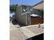 Exterior shot of a two-story unit featuring neutral siding, a satellite dish, and low maintenance landscaping at 2301 E University Dr # 280, Mesa, AZ 85213