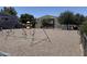 Community playground featuring a variety of equipment, including swings, slides, and climbing structures at 2301 E University Dr # 280, Mesa, AZ 85213