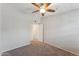 Bedroom featuring neutral carpet and doorway to bathroom at 2401 E Rio Salado Pkwy # 1047, Tempe, AZ 85288