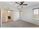 Neutral bedroom with carpet, ceiling fan and en suite bathroom at 2401 E Rio Salado Pkwy # 1047, Tempe, AZ 85288