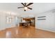 Living room showcases open layout with wood floors, leading into a well-equipped kitchen at 2401 E Rio Salado Pkwy # 1047, Tempe, AZ 85288