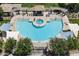 Aerial shot of community pool with lounge chairs, pergolas, and shaded seating at 2401 E Rio Salado Pkwy # 1047, Tempe, AZ 85288