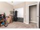 The spacious carpeted bedroom provides ample space and a sliding door closet at 30128 W Weldon Ave, Buckeye, AZ 85396