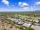 Aerial view of desert property with a private pool and solar panels at 33317 N 71St St, Scottsdale, AZ 85266