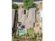 Aerial view showcasing the roof, backyard with a swimming pool, putting green, and tiled patio at 33317 N 71St St, Scottsdale, AZ 85266