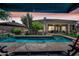 Beautiful backyard pool featuring desert landscaping and a patio with stunning sunset views at 33317 N 71St St, Scottsdale, AZ 85266