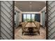 Beautiful dining room with long wooden table and comfortable chairs, perfect for hosting a dinner at 33317 N 71St St, Scottsdale, AZ 85266