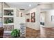 Inviting hallway with stylish stone accents and tasteful decorative niches at 33317 N 71St St, Scottsdale, AZ 85266