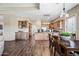 Open concept kitchen with stainless appliances, wood cabinets, and a large center island at 33317 N 71St St, Scottsdale, AZ 85266