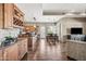 Spacious kitchen features a center island, breakfast bar, and open access to the dining area at 33317 N 71St St, Scottsdale, AZ 85266