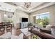 Cozy living space features natural light, wood floors, and seamless flow to the outdoors at 33317 N 71St St, Scottsdale, AZ 85266