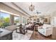 Inviting living room with stone fireplace, plush seating, and a bright, open feel at 33317 N 71St St, Scottsdale, AZ 85266
