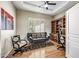 Bright office space featuring stylish decor, comfortable seating, and a ceiling fan at 33317 N 71St St, Scottsdale, AZ 85266