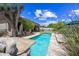Backyard pool featuring desert landscaping, outdoor seating, and privacy, perfect for relaxation and entertaining at 33317 N 71St St, Scottsdale, AZ 85266