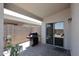 Back patio with brick pavers and a grill at 42382 W Hillman Dr, Maricopa, AZ 85138