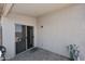 Back patio with brick pavers and a sliding door at 42382 W Hillman Dr, Maricopa, AZ 85138
