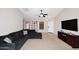 Comfortable living room featuring neutral walls, and stylish furniture at 42382 W Hillman Dr, Maricopa, AZ 85138