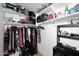 Organized walk-in closet with ample shelving and hanging space for efficient storage, maximizing space and convenience at 42382 W Hillman Dr, Maricopa, AZ 85138