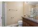 Bathroom with a glass bowl sink, wood cabinet, and tiled walk-in shower at 4601 N 102Nd Ave # 1055, Phoenix, AZ 85037