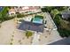 Beautiful aerial shot highlighting backyard oasis: pool, putting green, fire pit, and desert-style landscaping at 4633 N 49Th Pl, Phoenix, AZ 85018