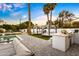 Inviting backyard featuring lounge seating, an outdoor kitchen, and relaxing views of the pool and landscaping at 4633 N 49Th Pl, Phoenix, AZ 85018