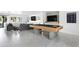 A stylish seating area with a pool table and TV, perfect for relaxation and entertainment at 4633 N 49Th Pl, Phoenix, AZ 85018