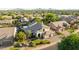 Beautiful home with a large three car garage, mature landscaping, neutral color palette, well manicured lawn and tile roof at 6435 E Monte Cristo Ave, Scottsdale, AZ 85254