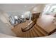 Bright and airy living room with staircase, neutral decor, hardwood floors and dining area at 6435 E Monte Cristo Ave, Scottsdale, AZ 85254