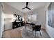 Home office showcasing modern decor, wood floors and a decorative rug at 6435 E Monte Cristo Ave, Scottsdale, AZ 85254