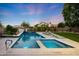Luxurious swimming pool and spa with lush landscaping, creating a private and relaxing backyard retreat at 6435 E Monte Cristo Ave, Scottsdale, AZ 85254