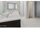 Bathroom with dual sinks, white countertops, and tile floors at 663 W Flintlock Way, Chandler, AZ 85286