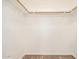 Spacious walk in closet featuring wood look flooring at 7061 E Broadway Rd # 48, Mesa, AZ 85208