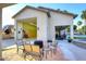 Spacious backyard patio featuring a fire pit and outdoor seating at 8026 W Villa Lindo Dr, Peoria, AZ 85383