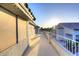 Outdoor balcony with tiled floors and a white railing with a view of the neighborhood at 8026 W Villa Lindo Dr, Peoria, AZ 85383
