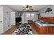 Bedroom featuring modern two-tone paint, ceiling fan and a large window at 8026 W Villa Lindo Dr, Peoria, AZ 85383