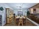Cozy dining room with rustic wooden furniture and decorative antler chandelier at 8026 W Villa Lindo Dr, Peoria, AZ 85383