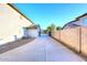 Long driveway lined with gravel and a block wall leading up to the property at 8026 W Villa Lindo Dr, Peoria, AZ 85383
