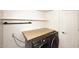 Laundry room featuring front loading washer/dryer and a butcher block folding surface at 8026 W Villa Lindo Dr, Peoria, AZ 85383