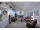 Bright living room with high ceilings, fireplace, and lots of natural light at 8026 W Villa Lindo Dr, Peoria, AZ 85383