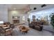 Spacious living room featuring a high ceiling, staircase and neutral color palette, ideal for gatherings at 8026 W Villa Lindo Dr, Peoria, AZ 85383