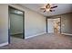 Spacious bedroom with plush carpet and easy access to bathroom and dining room at 1045 S Solomon St, Mesa, AZ 85204