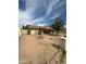 Quaint single-story home featuring a spacious front yard with minimal landscaping and neutral toned exterior at 1045 S Solomon St, Mesa, AZ 85204