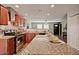 Beautiful kitchen featuring granite counters and stainless steel appliances with an open concept at 1045 S Solomon St, Mesa, AZ 85204